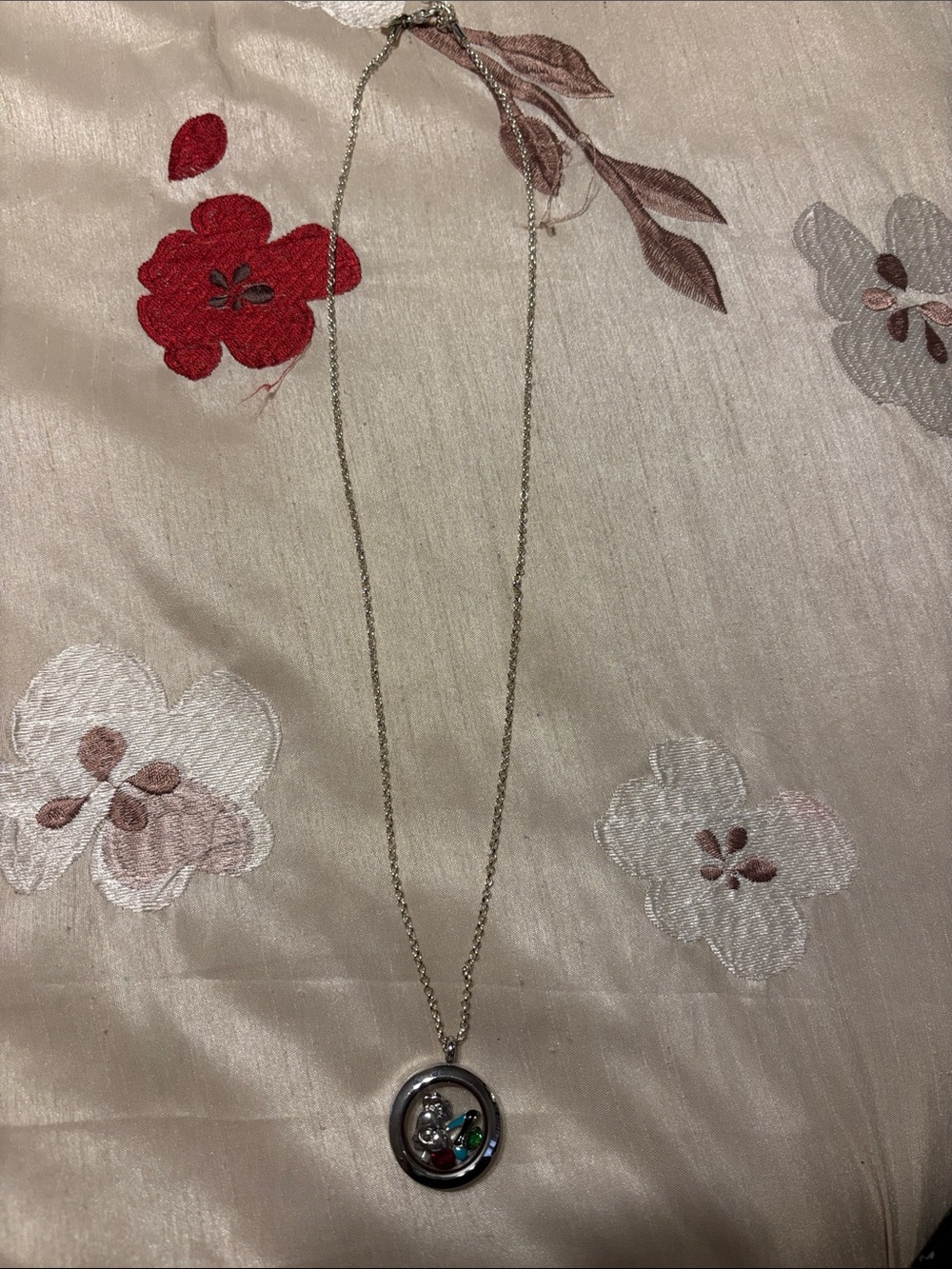 Silver Circle Pendant Necklace with different charms inside